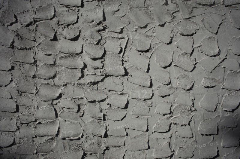 Textured grey cement wall