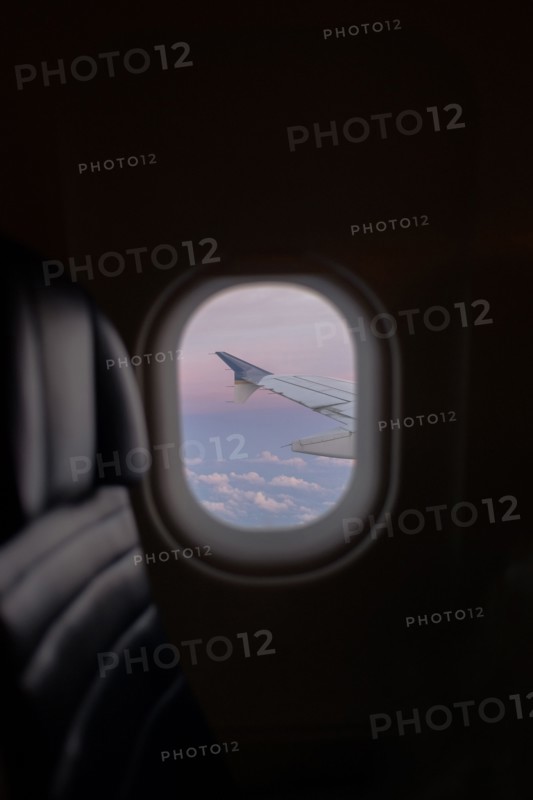 Airplane window in flight
