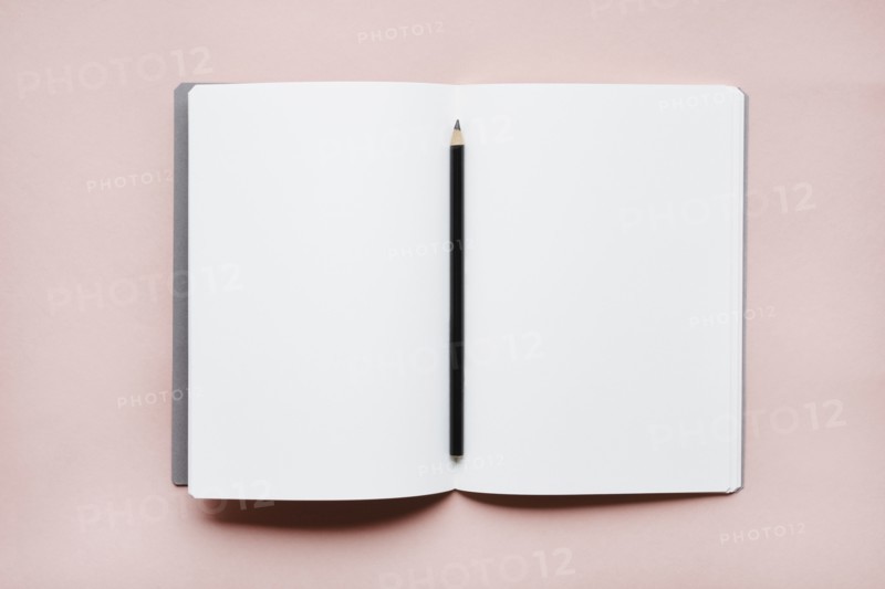 Pencil on open notebook