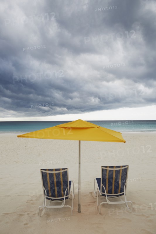 Chairs and umbrella on beach