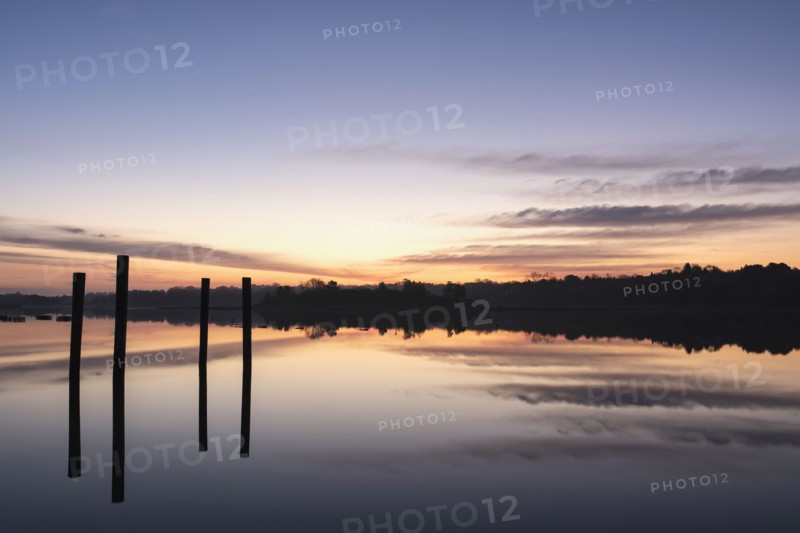 Posts in sea at sunrise
