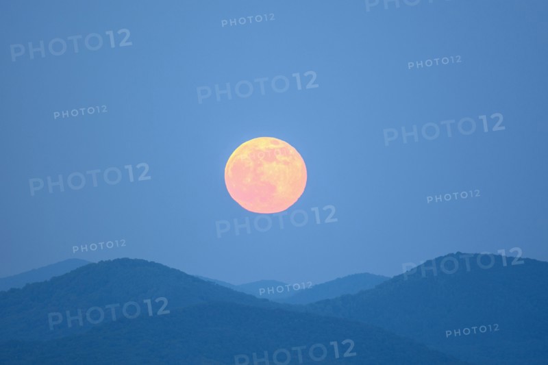 Full moon over Blue Ridge Mountains