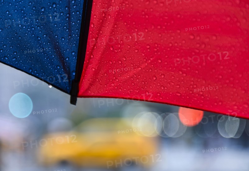 Close up of umbrella on rainy day