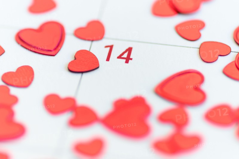 Red hearts on Valentine's Day box on calendar