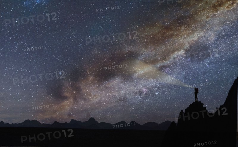 Silhouette of rocks under starscape in the Dolomites, South Tyrol, Italy