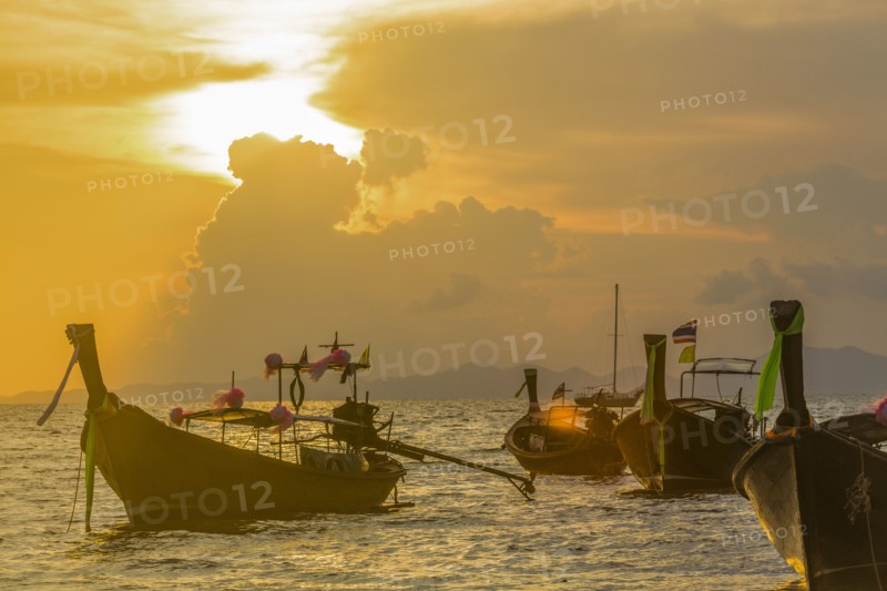 Boats at sunset in West Railay, Thailand