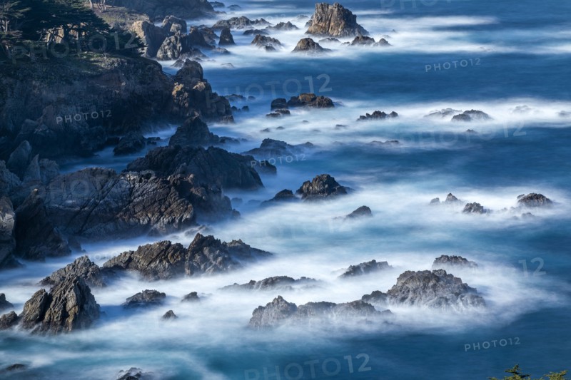 Long exposure shot of rocks in sea at Carmel-by-the-Sea, California, USA