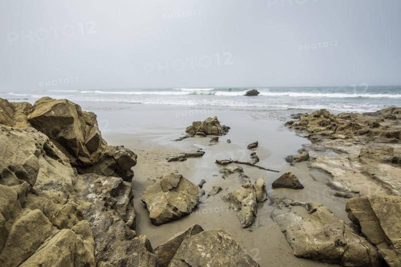 Rocks on beach in Morro Bay, California, USA
