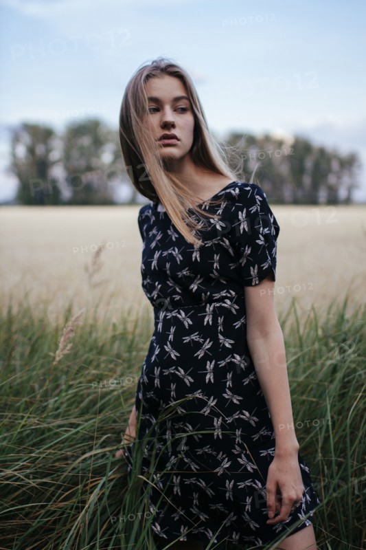 Young woman in field