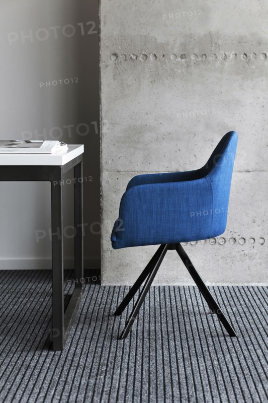 Blue chair by desk