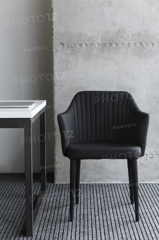 Black chair by desk