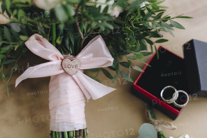 Wedding bouquet tied with pink ribbon