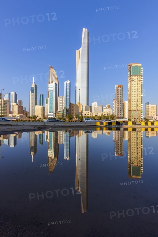 Skyline reflected in sea in Kuwait City, Kuwait