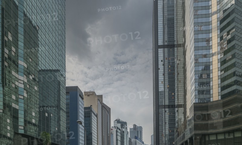 Modern office buildings on street in Hong Kong, China