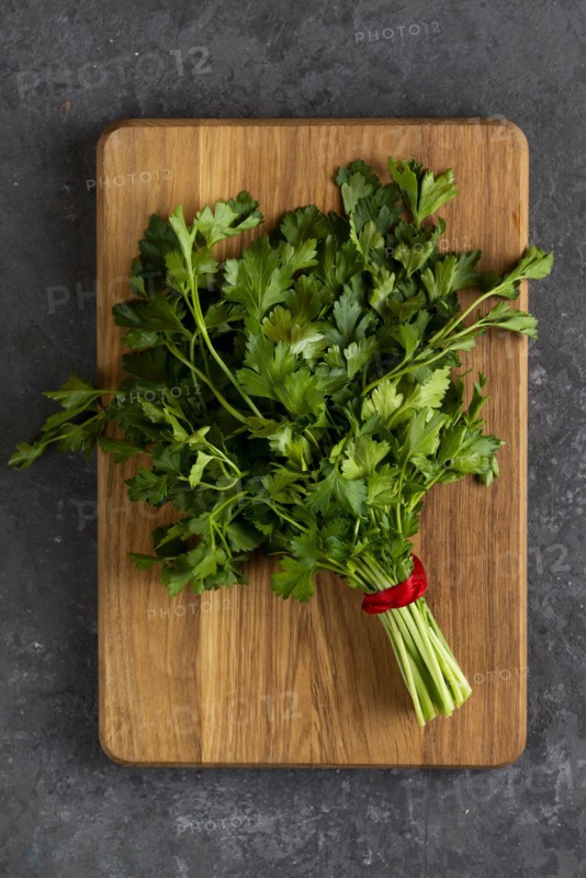Bunch of parsley on cutting board