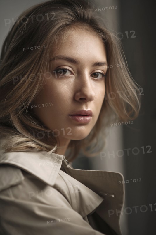 Portrait of young woman wearing natural make-up