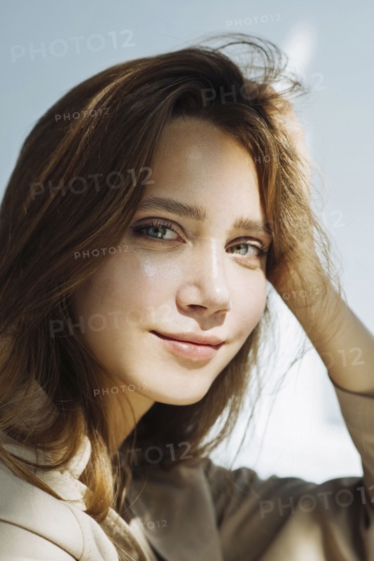 Portrait of young woman wearing natural make-up