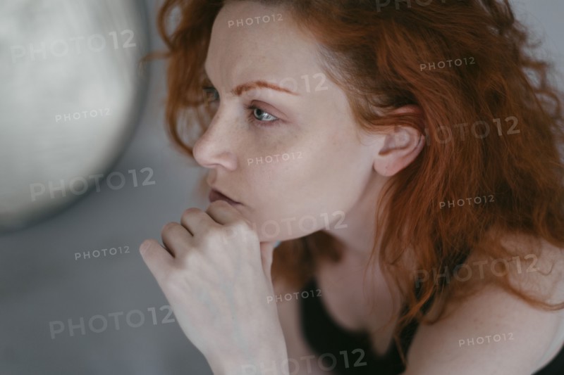 Portrait of redhead young woman