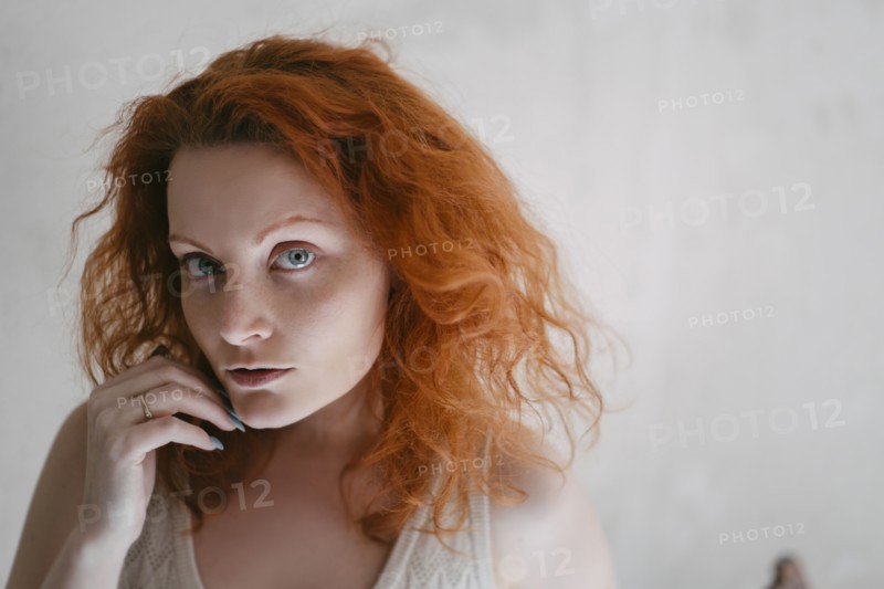 Portrait of redhead young woman