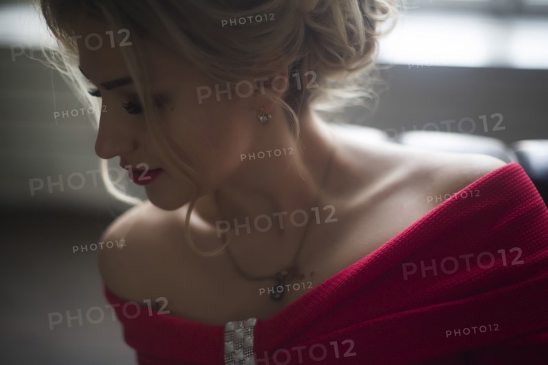 Young woman wearing red lipstick