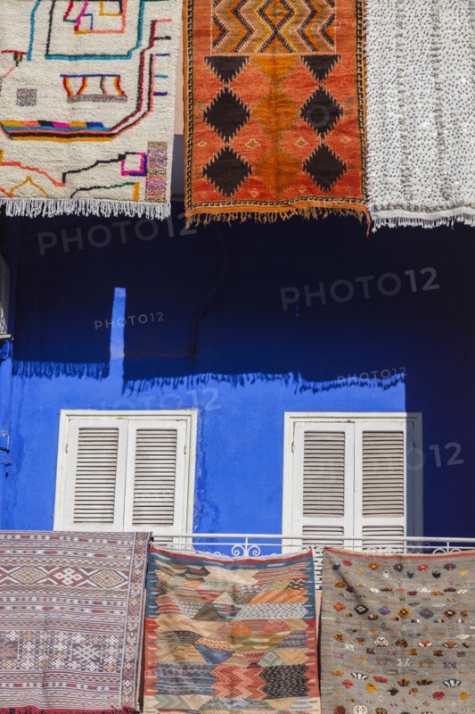 Rugs hanging from balconies in Marrakesh, Morocco
