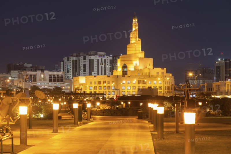 Abdulla Bin Zaid Al Mahmoud Islamic Cultural Center at night in Doha, Qatar