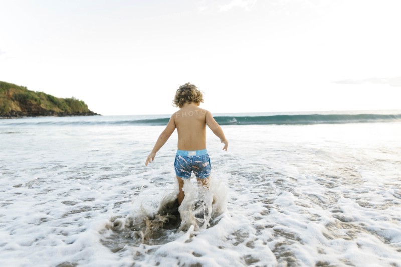 Boy playing on beach