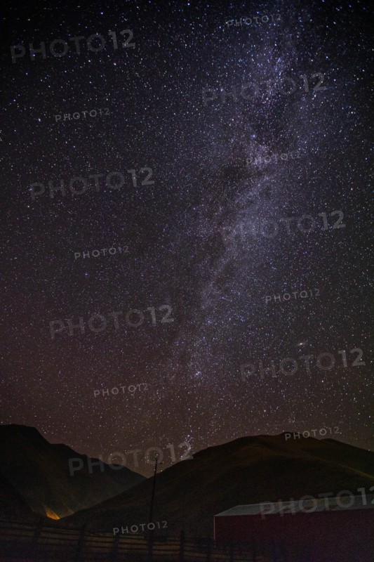 Milky Way galaxy over mountains