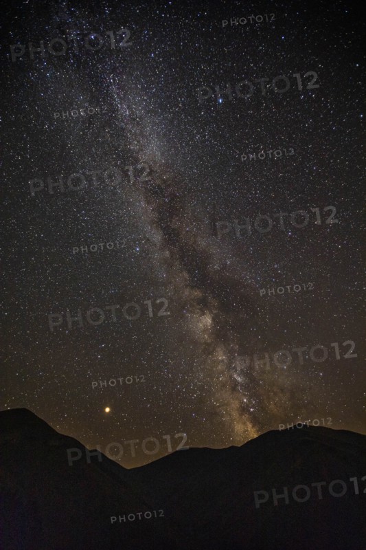Milky Way galaxy over mountains