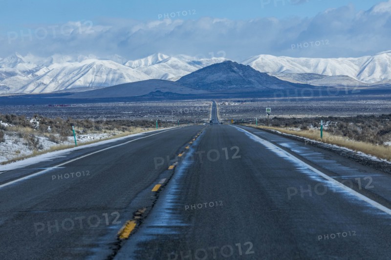 Road to snowcapped mountains in Sun Valley, Idaho, USA