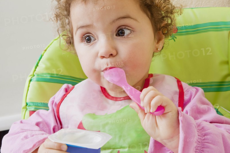 Girl eating yoghurt