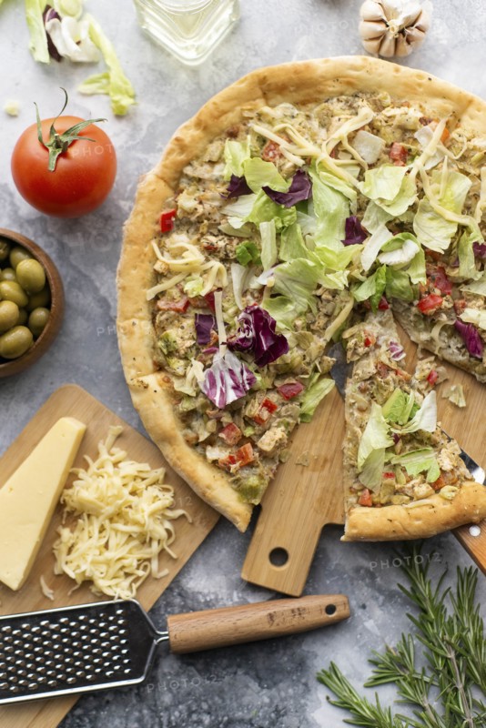 Pizza topped with cabbage