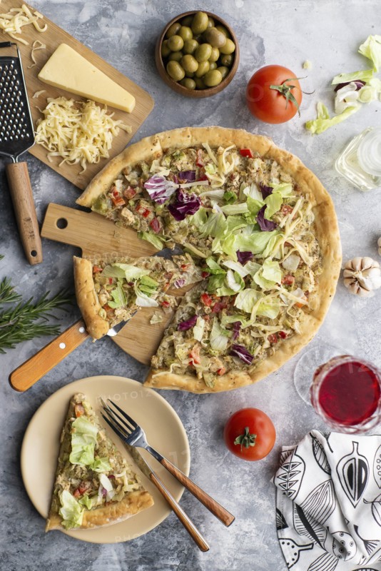Pizza topped with cabbage