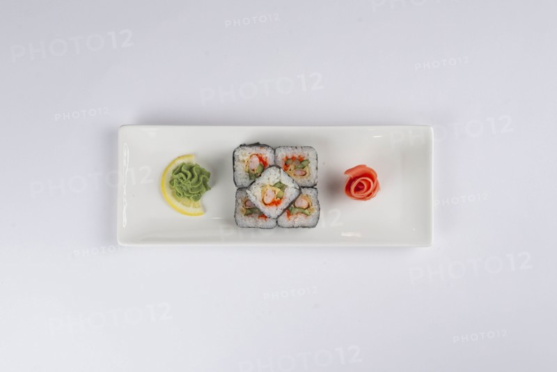 Plate of sushi with pickled ginger and wasabi