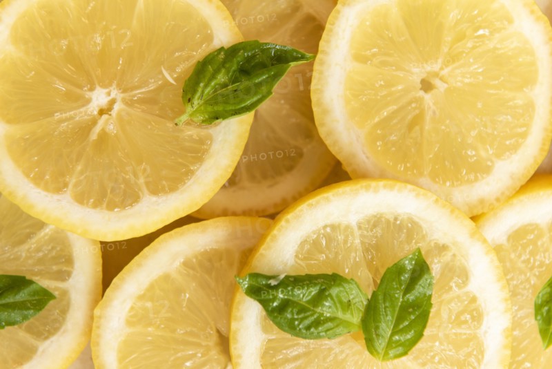 Sliced lemon with basil