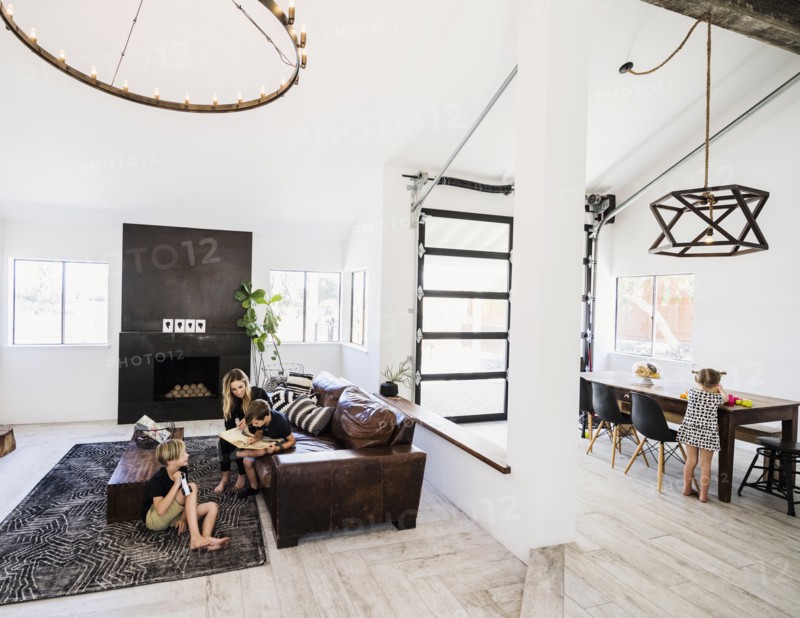 Family in open plan living and dining area