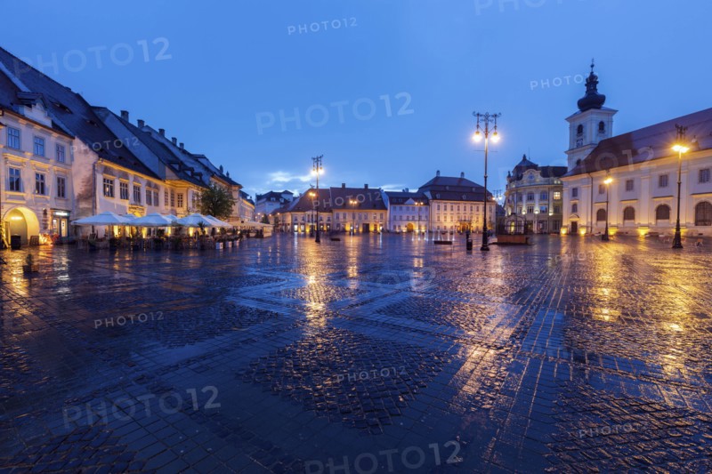 Wet Grand Square at sunset in Sibiu