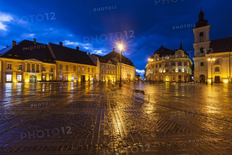 Wet Grand Square at sunset in Sibiu