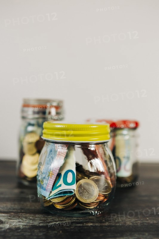 Euro currency in glass jars