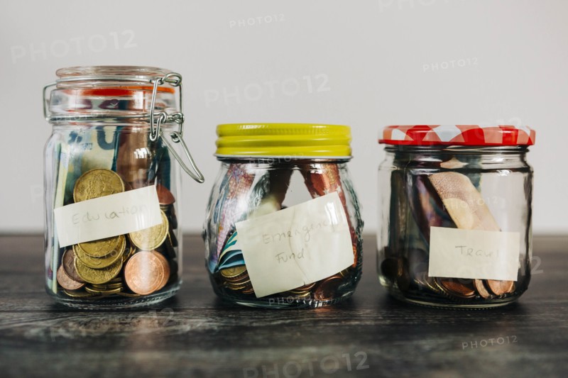Euro currency in glass jars