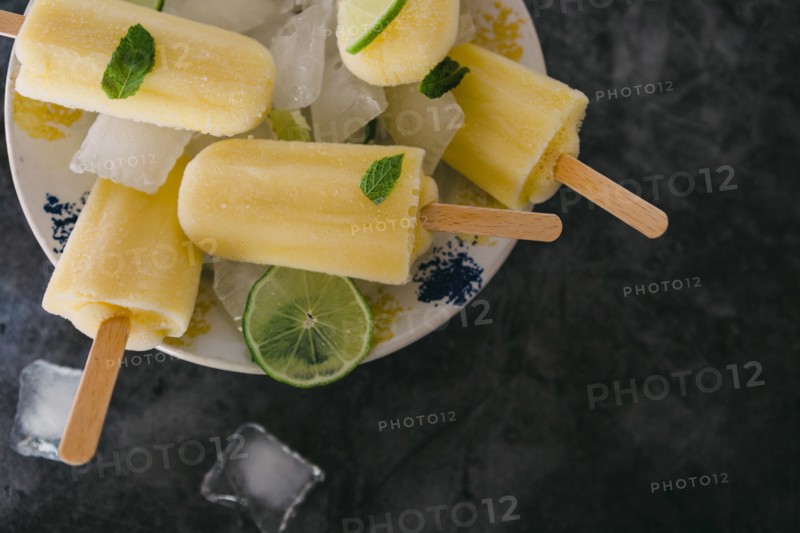Lemon ice pops with mint and lime