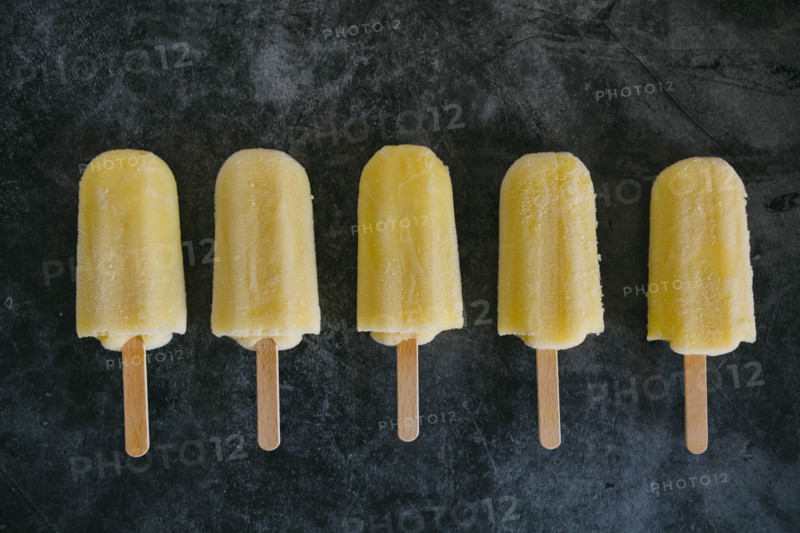 Row of lemon ice pops