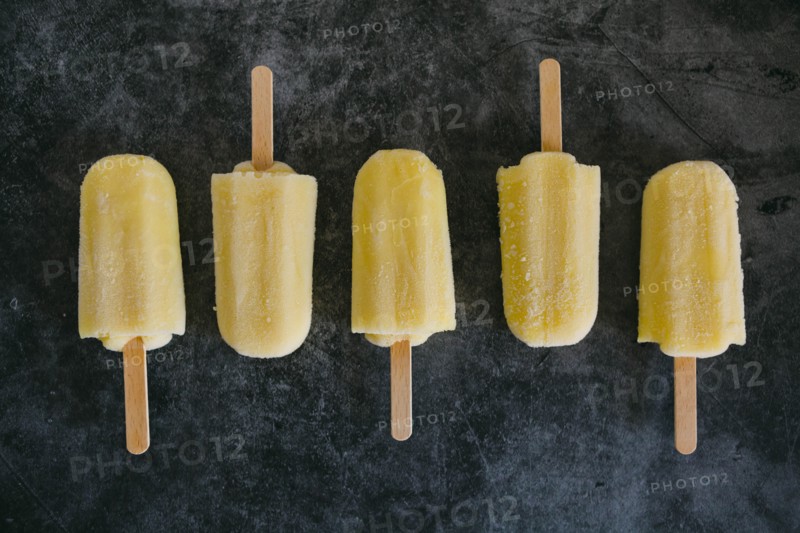 Row of lemon ice pops