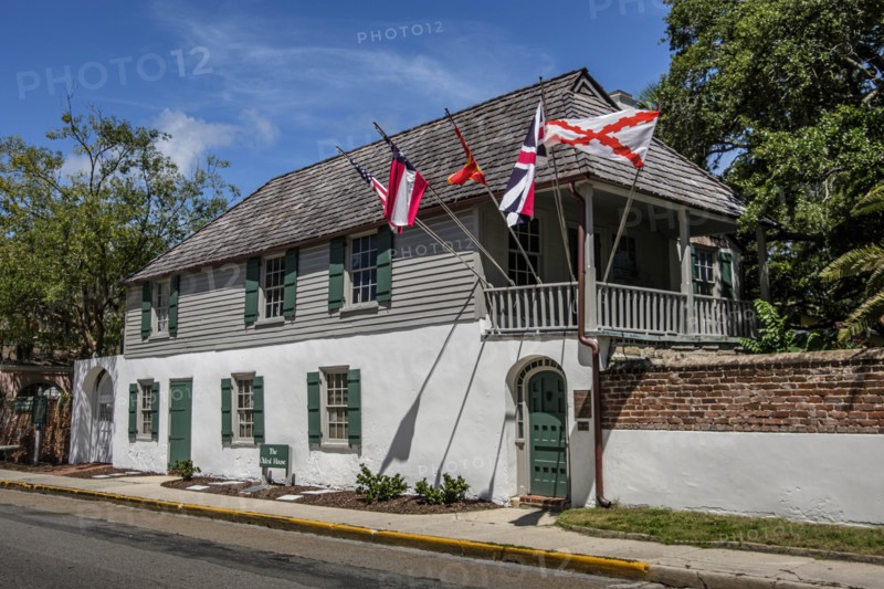 House with multiple flags in St. Augustine