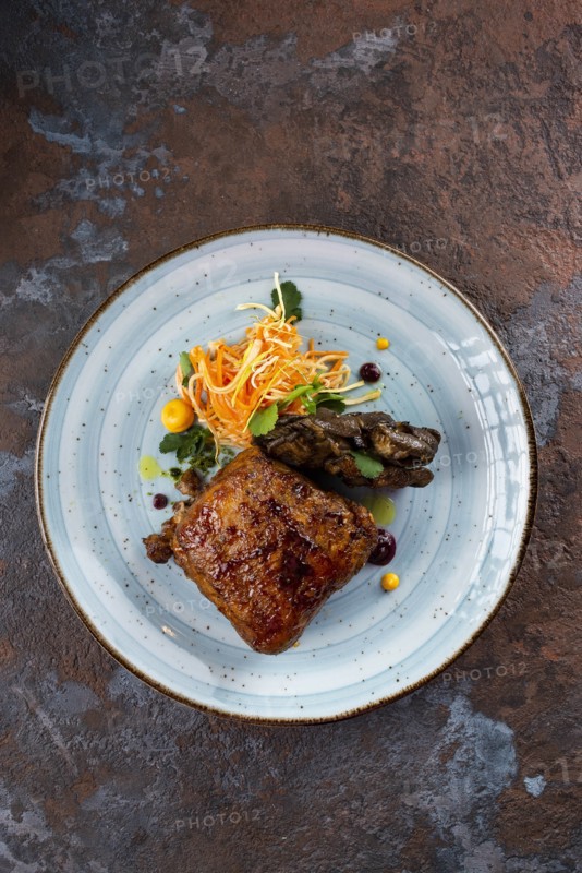 Grilled meat with salad