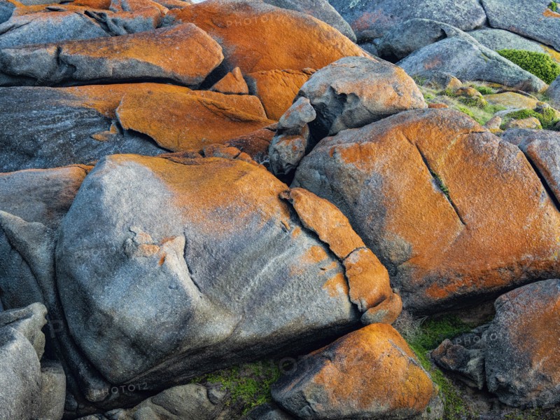 Orange and grey rocks on Granite Island, Australia