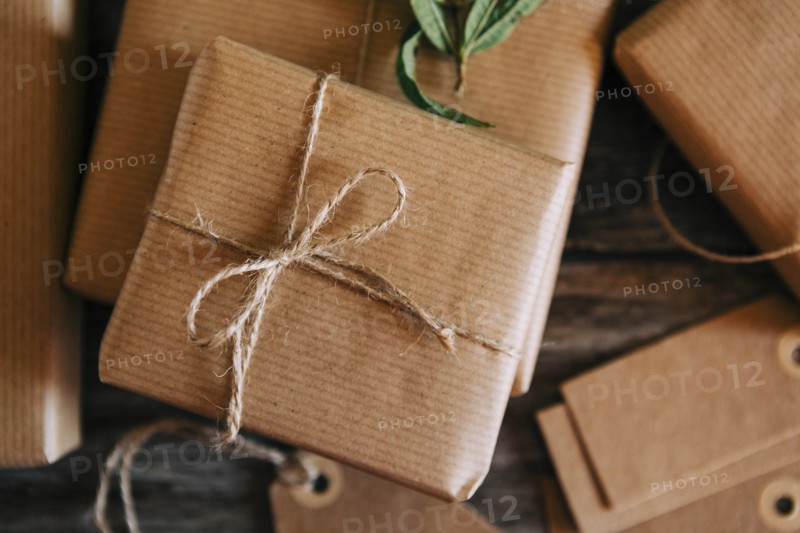 Presents wrapped in brown paper and string