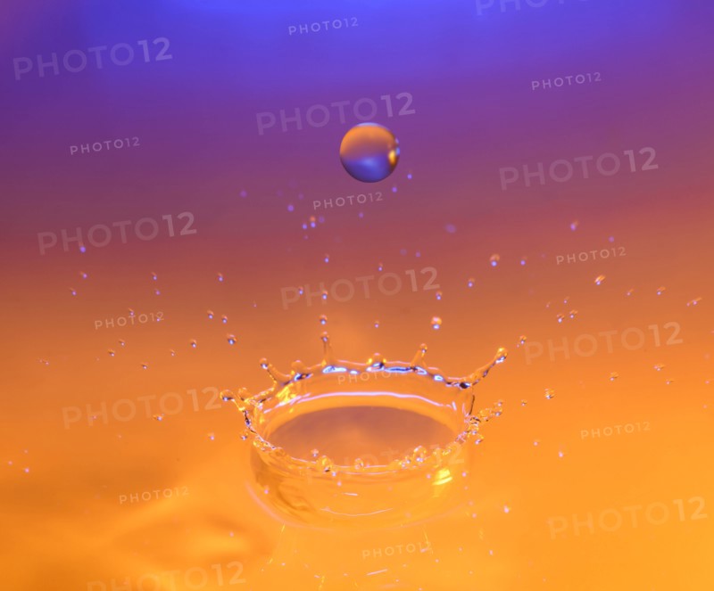 Orange and purple splashing water