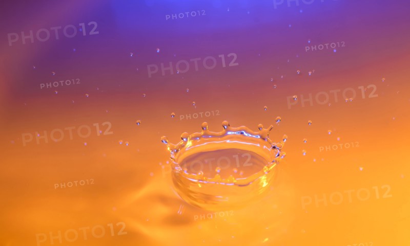 Orange and purple splashing water