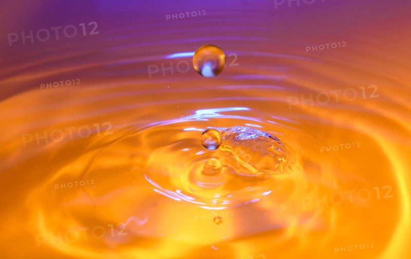 Orange and purple splashing water